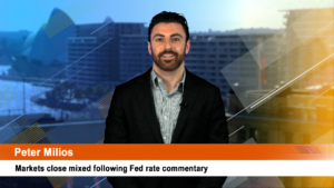 Markets close mixed following Fed rate commentary